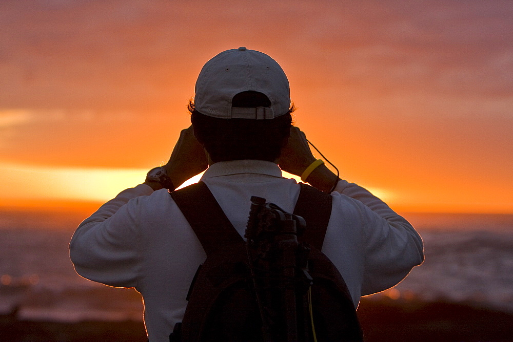 Crew member Juan Carlos Alvia of the Lindblad Expeditions ship the National Geographic Polaris in the waters surrounding the Galapagos Island Archipelago, Ecuador