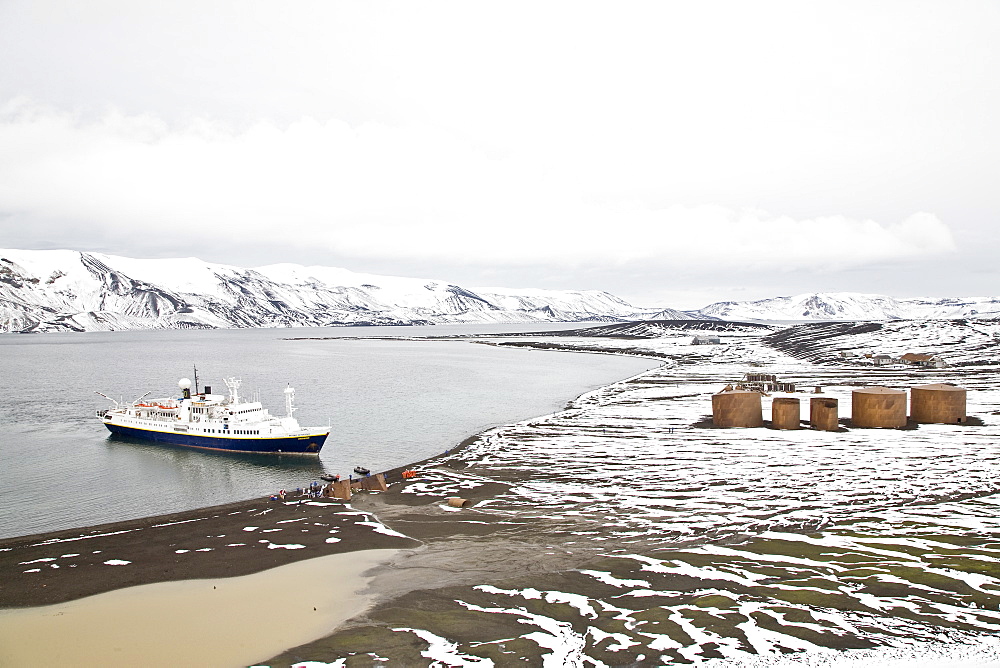 The Lindblad Expedition ship National Geographic Endeavour operating in Whalers Bay inside the caldera of Deception Island in the South Shetland Islands, Antarctica