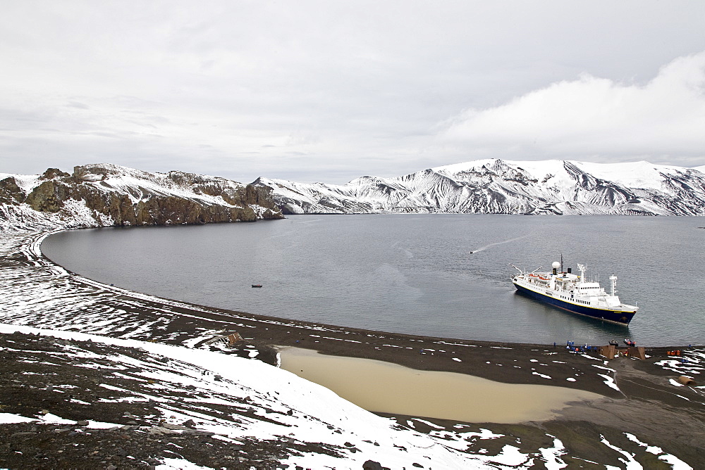 The Lindblad Expedition ship National Geographic Endeavour operating in Whalers Bay inside the caldera of Deception Island in the South Shetland Islands, Antarctica