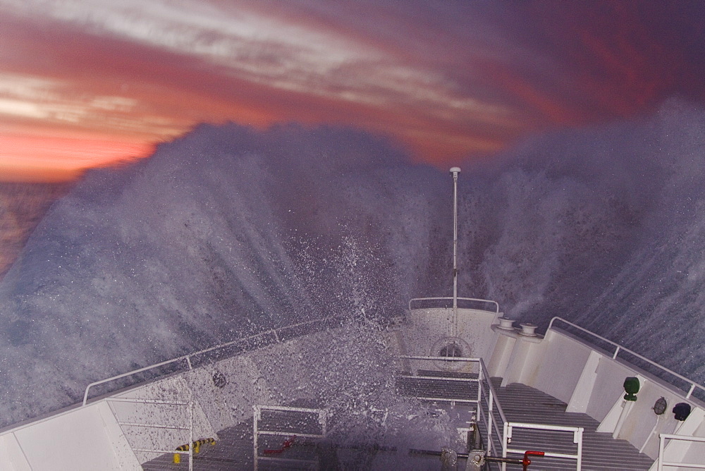 The Lindblad Expedition ship National Geographic Endeavour on approach at sunset to the Falkland Islands, South Atlantic Ocean