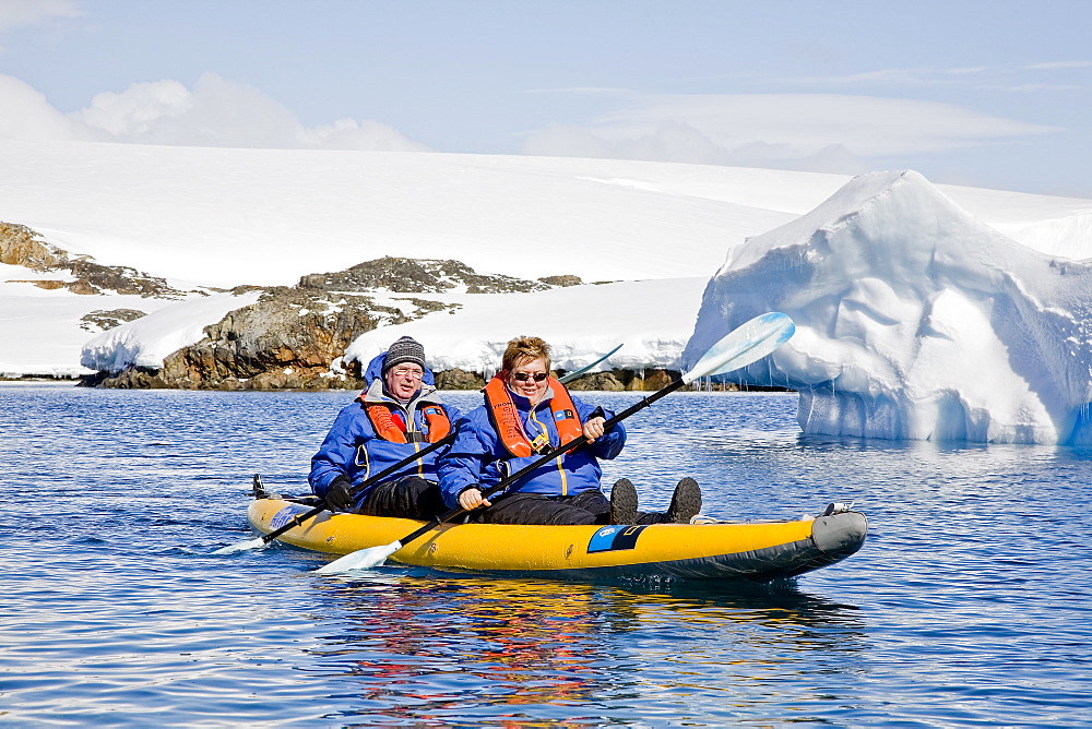 Guests from the Lindblad Expedition ship National Geographic Explorer kayaking in and around the Antarctic Peninsula in the summer months.