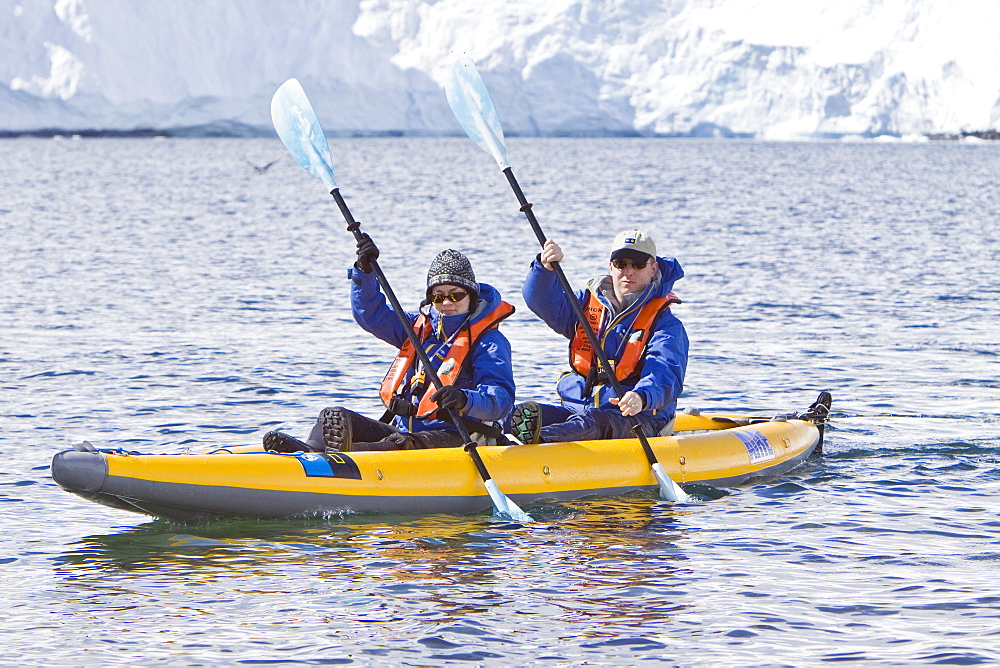 Guests from the Lindblad Expedition ship National Geographic Explorer kayaking in and around the Antarctic Peninsula in the summer months.