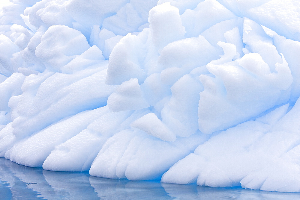 The Lindblad Expeditions ship National Geographic Explorer pushes through ice near Larrouy Island in Grandidier Channel