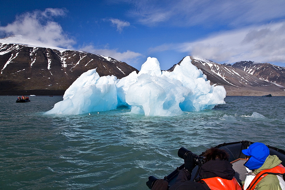 Guests from the Lindblad Expedition ship National Geographic Explorer doing various things in and around the Svalbard Archipelago