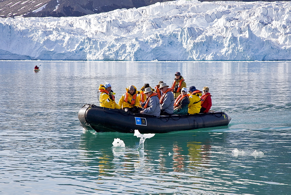 Guests from the Lindblad Expedition ship National Geographic Explorer doing various things in and around the Svalbard Archipelago