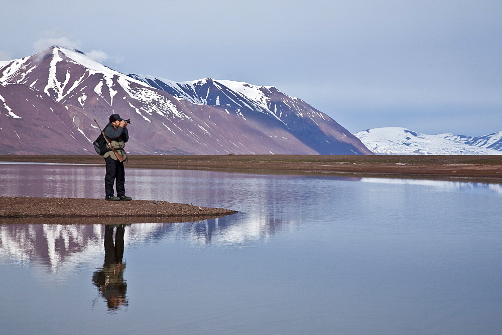 Natural history staff from the Lindblad Expedition ship National Geographic Explorer doing various things in and around the Svalbard Archipelago