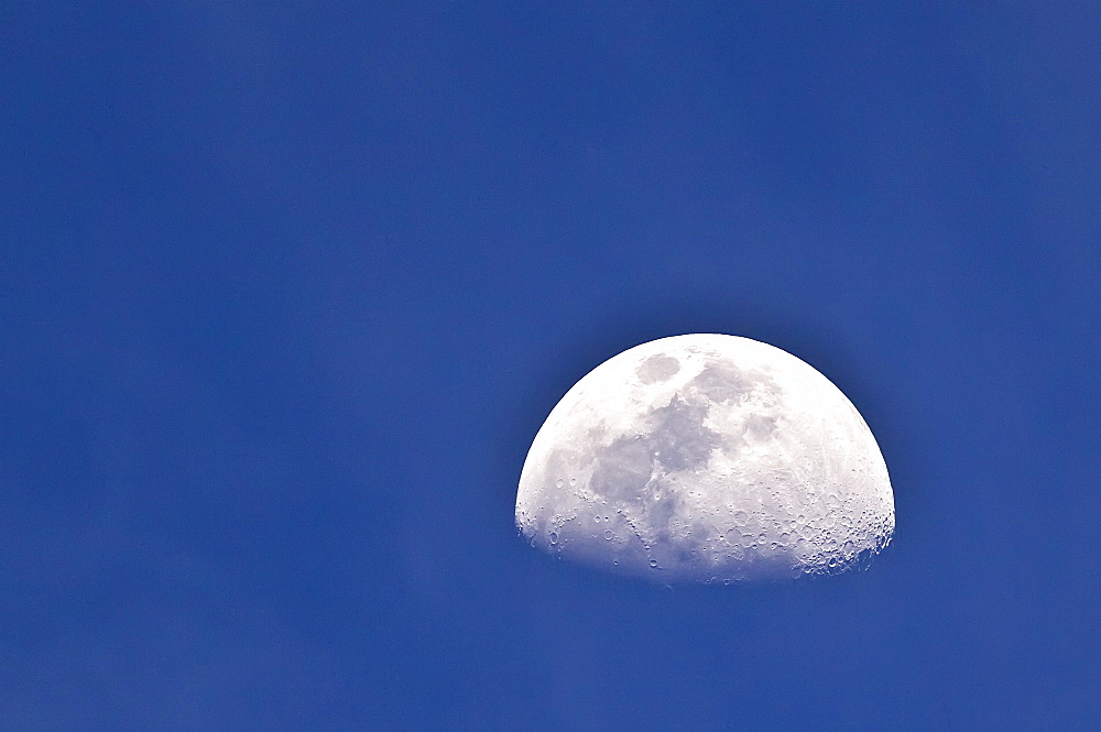 The waxing moon over the Baja Peninsula, Baja California Sur, Mexico.