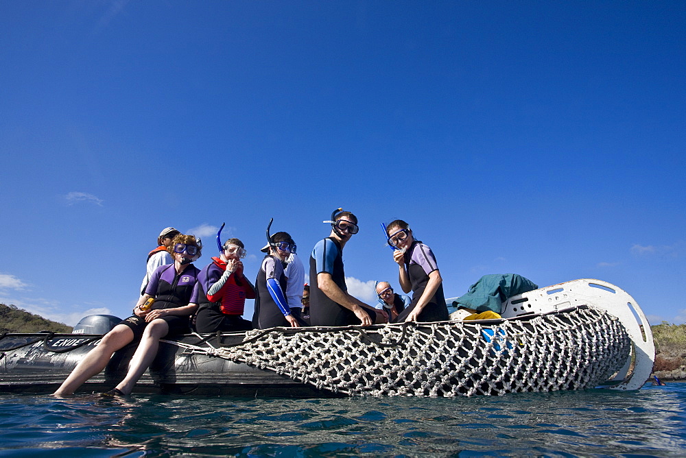 Lindblad Expeditions Guests preparing to snorkel in the Galapagos Island Archipeligo, Ecuador. No model or property releases available for tis image.