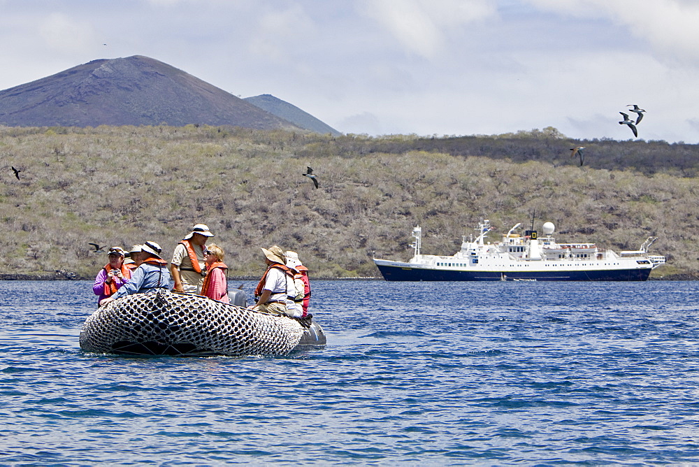 The Lindblad Expedition ship National Geographic Endeavour and its Zodiac fleet operating in the Galapagos Islands, Ecuador, Pacific Ocean.