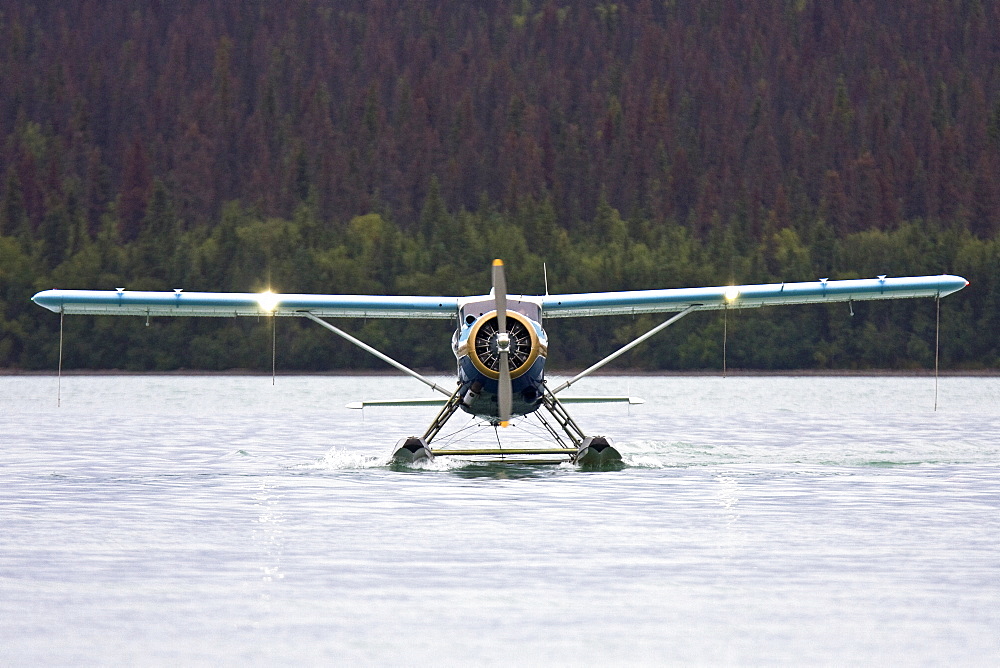 Small float planes being used to shuttle bear watchers between the town of King Salmon and a bear watching lodge at Brooks Camp in Katmai National Park, Alaska, USA. Pacific Ocean.