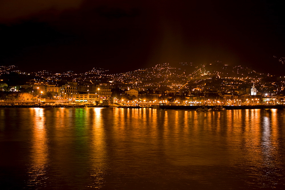 Pre-dawn rain lightly falling on the city of Funchal, Madeira, Portugal