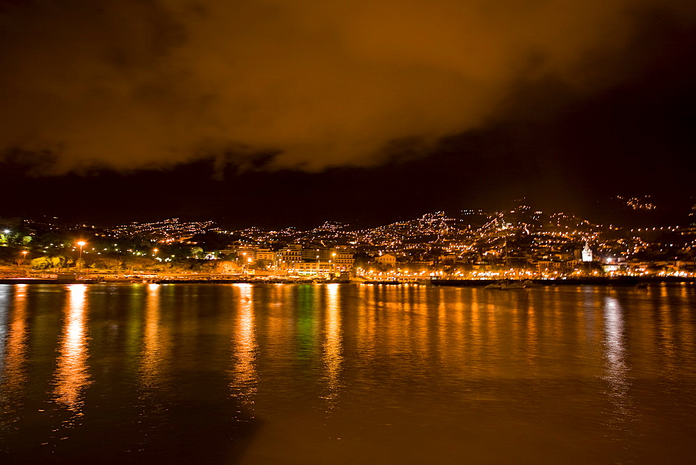 Pre-dawn rain lightly falling on the city of Funchal, Madeira, Portugal