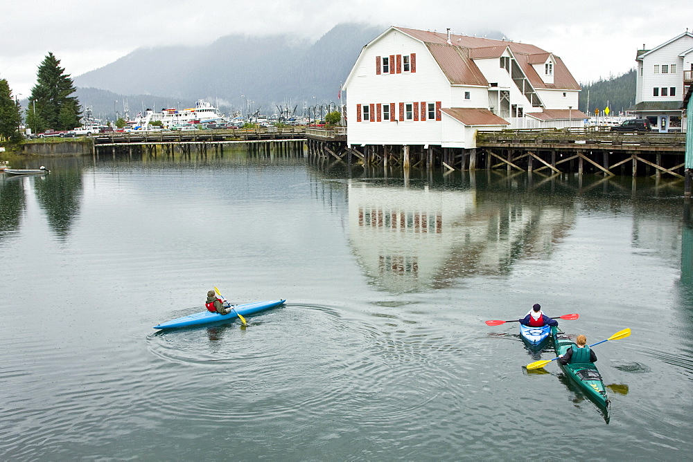 Kayaking in the slough in the small town of Petersburg in Southeast Alaska, USA. Pacific Ocean. No model or property release available for this photograph.