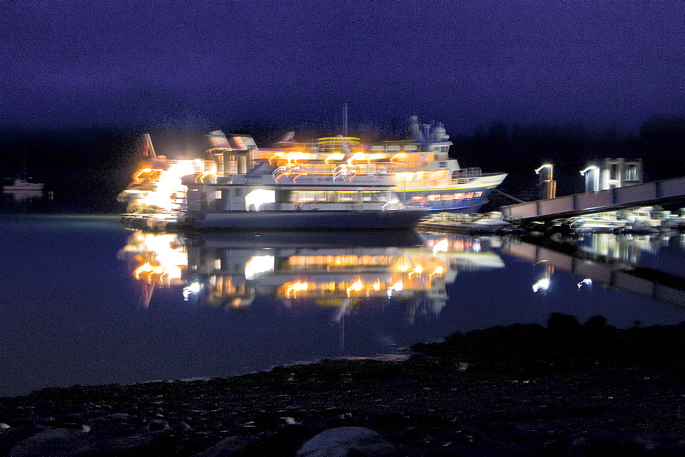 The Lindblad Expeditions ship National Geographic Sea Lion docked at Gustavus in the evening in Southeast Alaska, USA. Pacific Ocean.