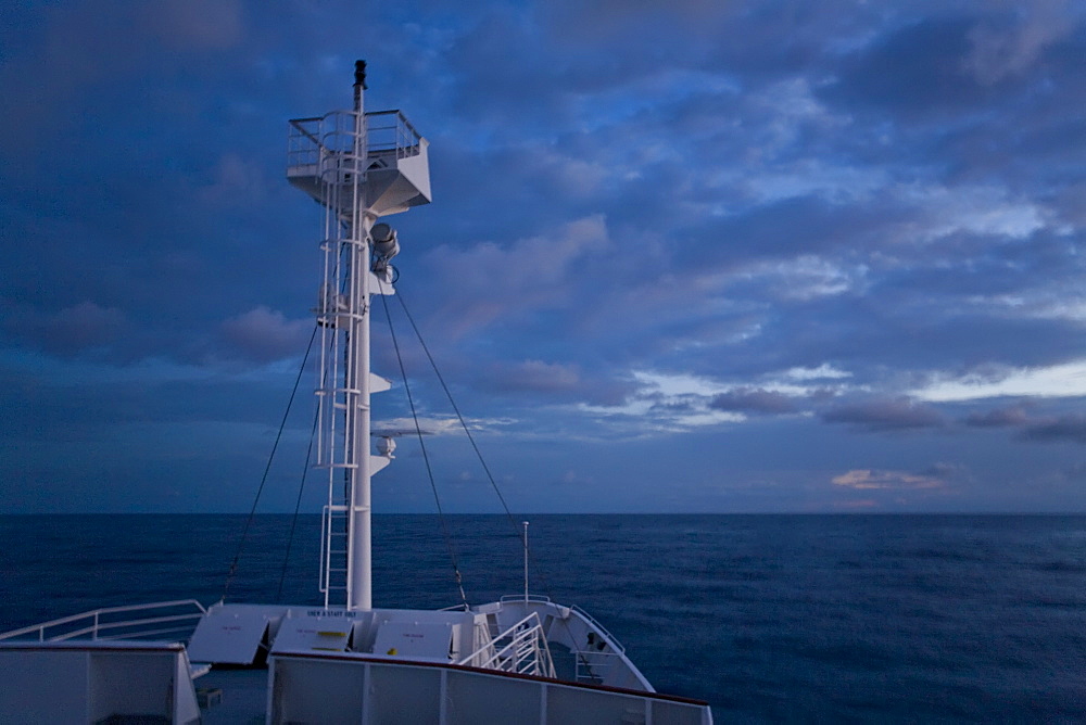 Sunrise or sunset at sea in the Atlantic Ocean from onboard the National Geographic Endeavour crossing the Atlantic Ocean from Lisbon, Portugal to Salvador, Brazil.