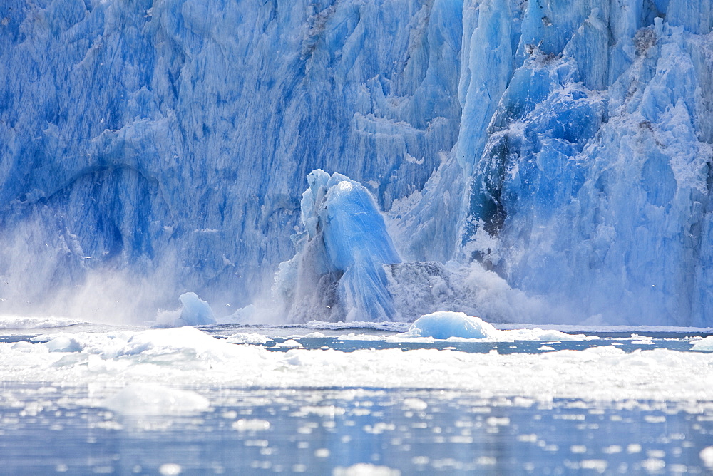 A HUGE calving event from the South Sawyer Glacier in Tracy Arm Wilderness Area in Southeast Alaska, USA