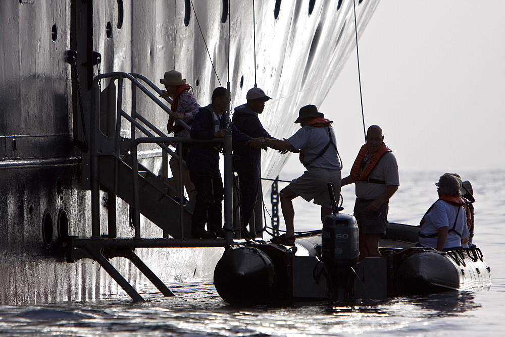 Crew and guest on Zodiacs in the Atlantic Ocean from onboard the National Geographic Endeavour crossing the Atlantic Ocean from Lisbon, Portugal to Salvador, Brazil