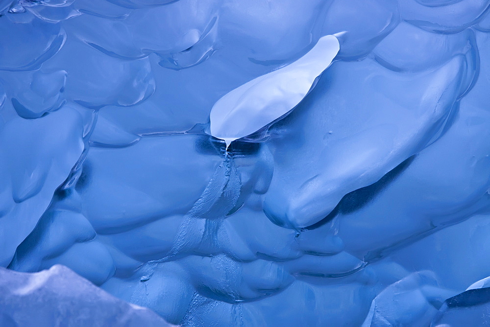 Glacial iceberg detail from ice calved off the Sawyer Glacier in Tracy Arm, Southeast Alaska, USA. 