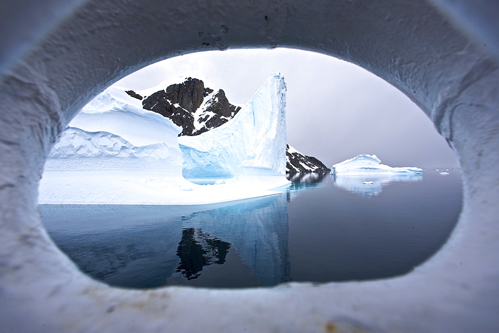 Iceberg detail through ships bow in and around the Antarctic Peninsula during the summer months