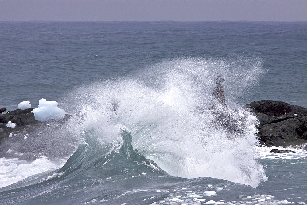 Heavy storm clouds and ice choked waters surround Point Wild on Elephant Island