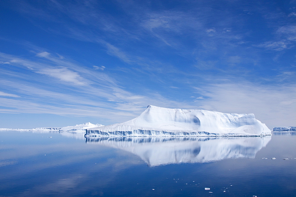 The Lindblad Expeditions ship National Geographic Explorer pushes through ice in Crystal Sound, south of the Antarctic Circle, Antarctica, Southern Ocean