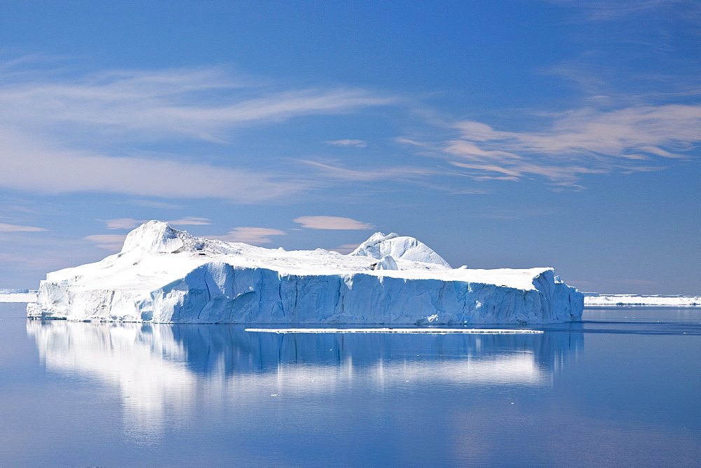 The Lindblad Expeditions ship National Geographic Explorer pushes through ice in Crystal Sound, south of the Antarctic Circle, Antarctica, Southern Ocean