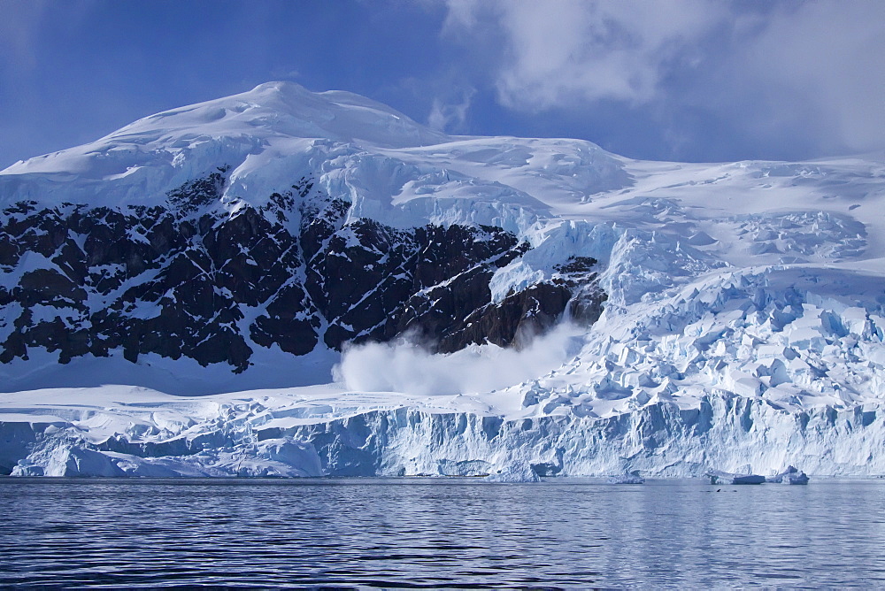 Small avalanche in Neko Harbour on the Antarctic Peninsula in Andvord Bay, Antarctica, Southern Ocean