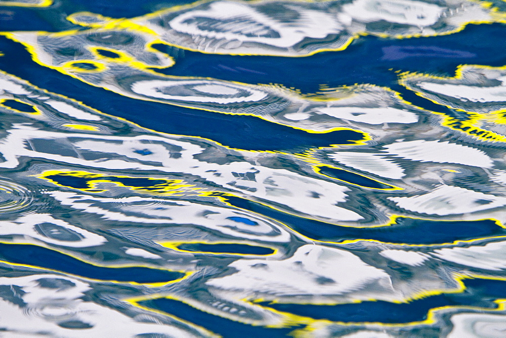 Reflections in calm water photographed from the Lindblad Expedition Ship National Geographic Explorer operating in Antarctica, Southern Ocean.