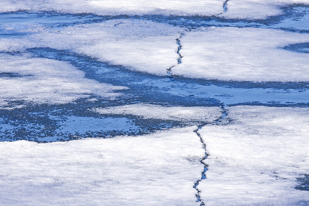 Open leads surrounded by multi-year ice floes in the Barents Sea between EdgeÃ®ya (Edge Island) and Kong Karls Land in the Svalbard Archipelago, Norway.