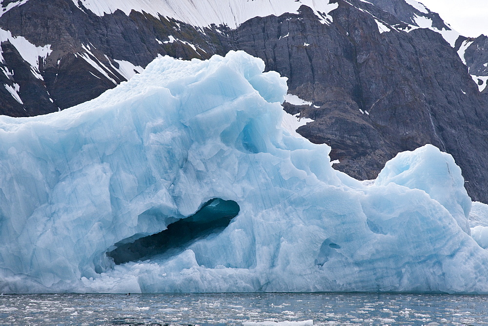 Calved icebergs from the glaciers at BlomstrandhalvÃ®ya in Kongsfjord on the western side of Spitsbergen in the Svalbard Archipelago, Norway.