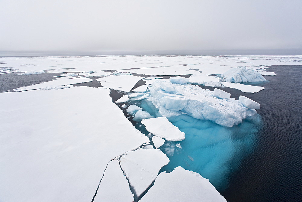 Open leads surrounded by multi-year ice floes in the Barents Sea between EdgeÃ®ya (Edge Island) and Kong Karls Land in the Svalbard Archipelago, Norway.