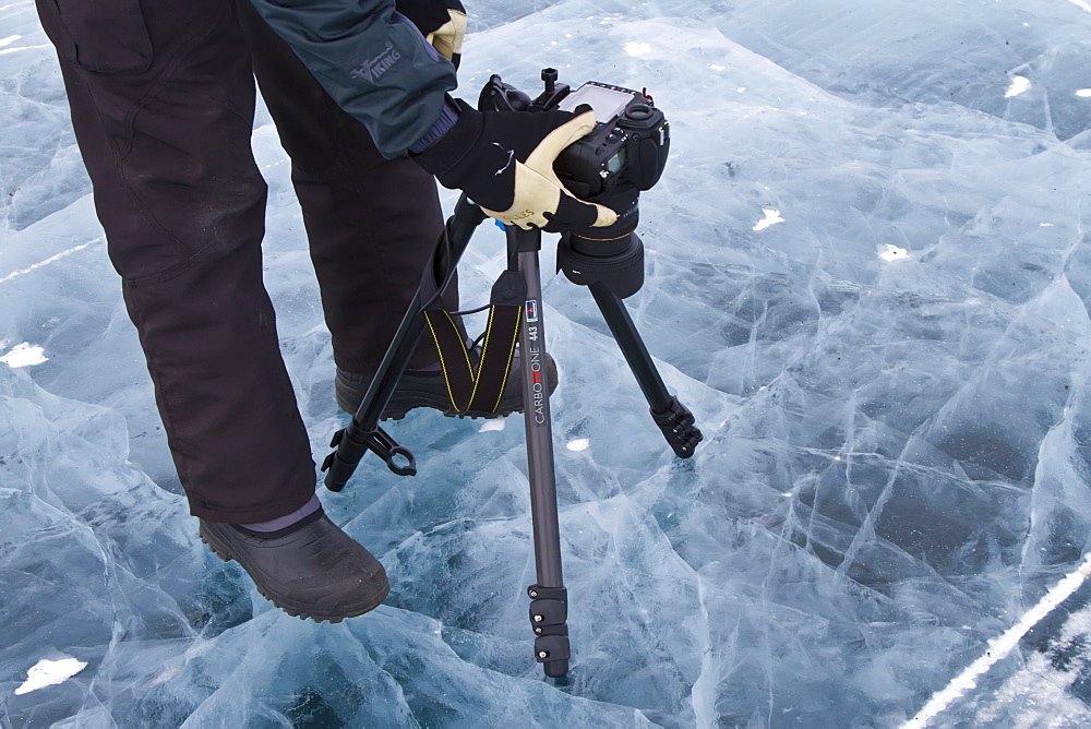 Canadian photographer Gilles Pucheu at work near his home in Yellowknife, Northwest Territories, Canada. MORE INFO Model release number GP032810.