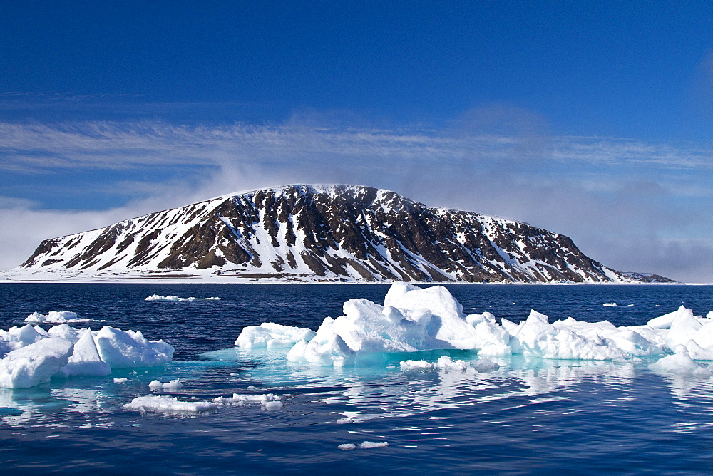 A view of ice-covered Phippsoya, the largest of the Sjuoyane Islands in the Svalbard Archipelago, Norway