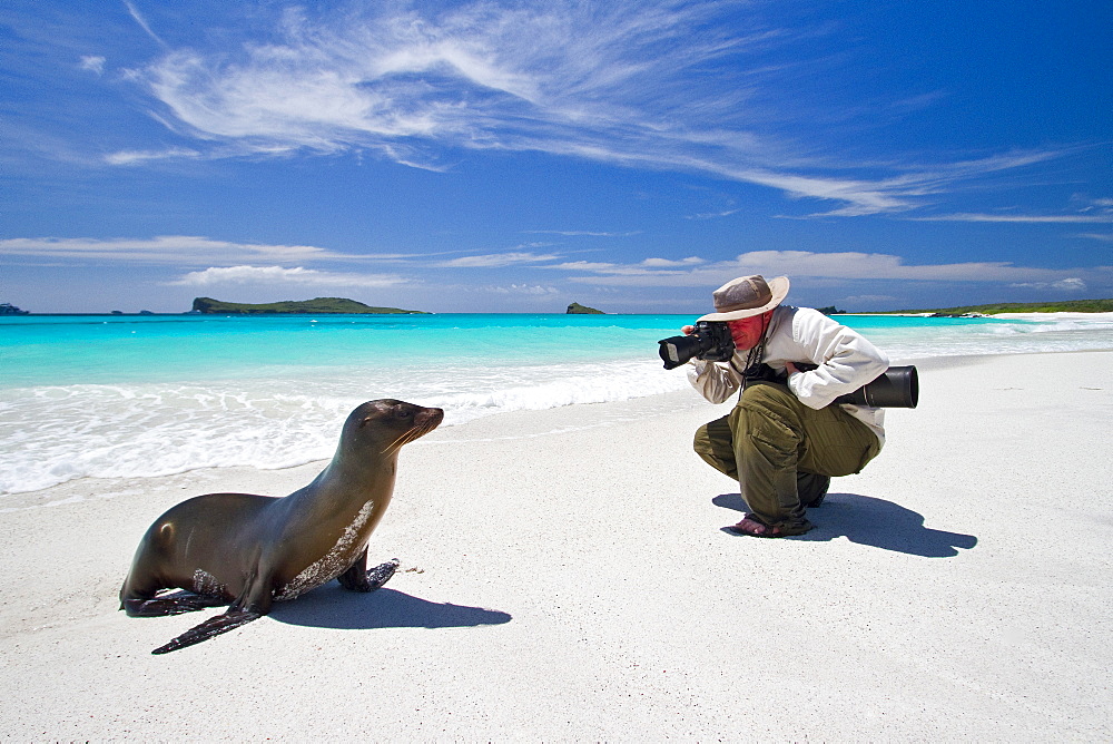 Staff (shown here is National Geographic photographer Joel Sartore) from the Lindblad Expedition ship National Geographic Endeavour in the Galapagos Islands, Ecuador