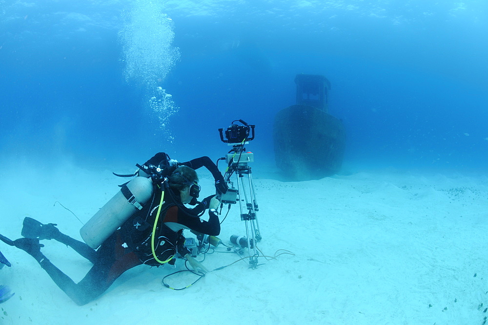 Michael pitts with underwater time lapse system on the wreck of the 'Blue Plunder'. Bahamas.