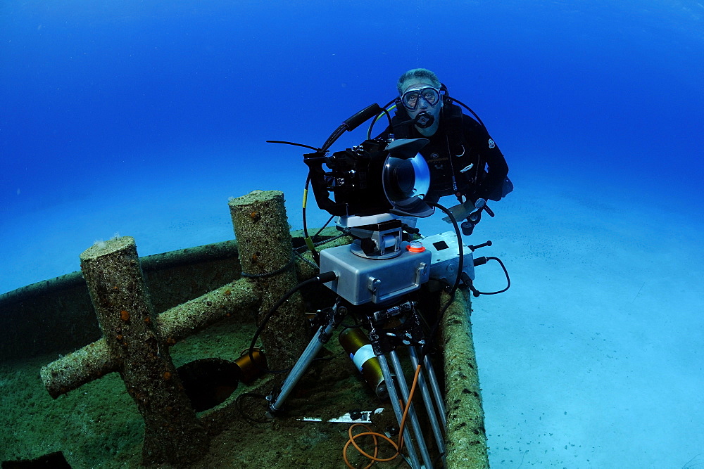 Neil Lucas with underwater time lapse system on the wreck of the 'Blue Plunder'. Bahamas.