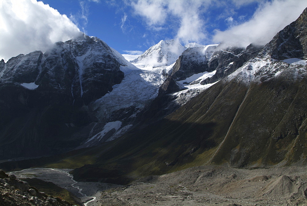 Tibetan  Mountain and Clouds. Valley River,  Himalayas, Tibet.