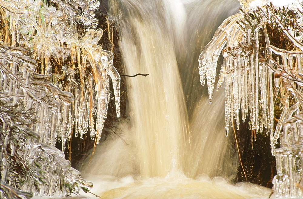 Icicles and gushing water