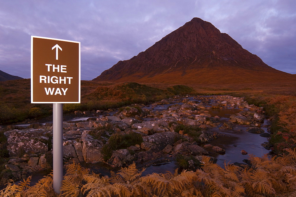 Spoof tourist sign  in front of  Buachaille Etive Mor, Scotland