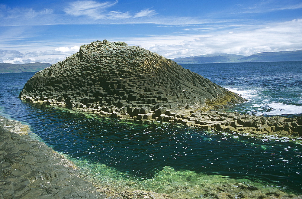 The 'Shepherd', Staffa.  This basalt column rock formation sits close to the one safe landing spot on Staffa. Hebrides, Scotland