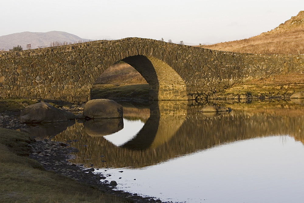 Bridge over tidal river at head of sea loch, Loch Don.  Hebrides, Scotland
