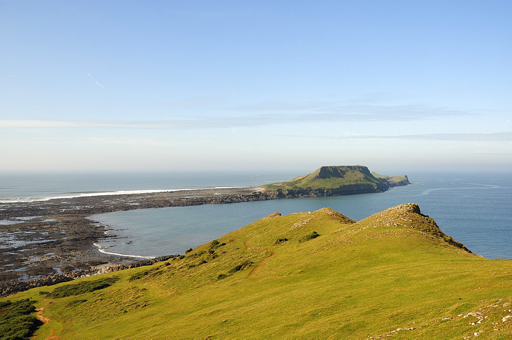 The Worm's Head with causeway exposed at low tide, Rhossili, The Gower peninsula, Wales, United Kingdom, Europe