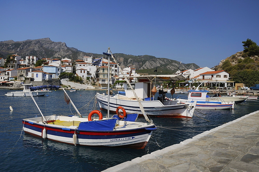 Fishing boats moored in Kokkari harbour, Samos, Eastern Sporades, Greek Islands, Greece, Europe