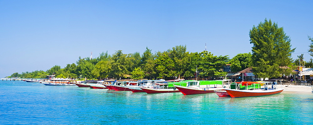 Gili Trawangan harbour, traditional boats on the crystal clear ocean at Gili Trawangan, Gili Islands, Indonesia, Southeast Asia, Asia