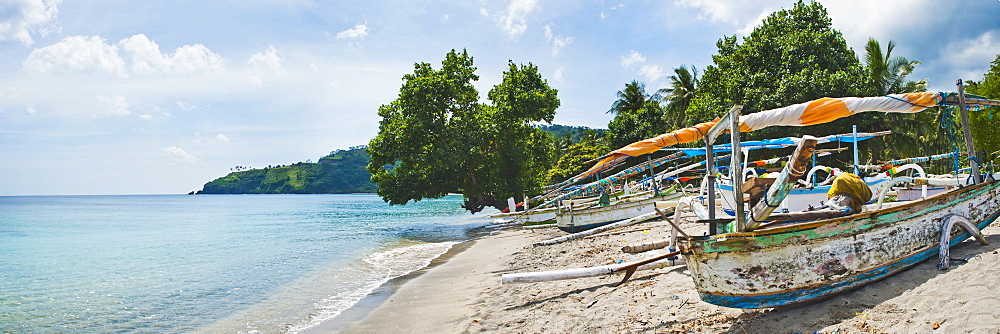 Traditional fishing boat at Nippah Beach on Lombok, a tropical island in West Nusa Tenggara, Indonesia, Southeast Asia, Asia