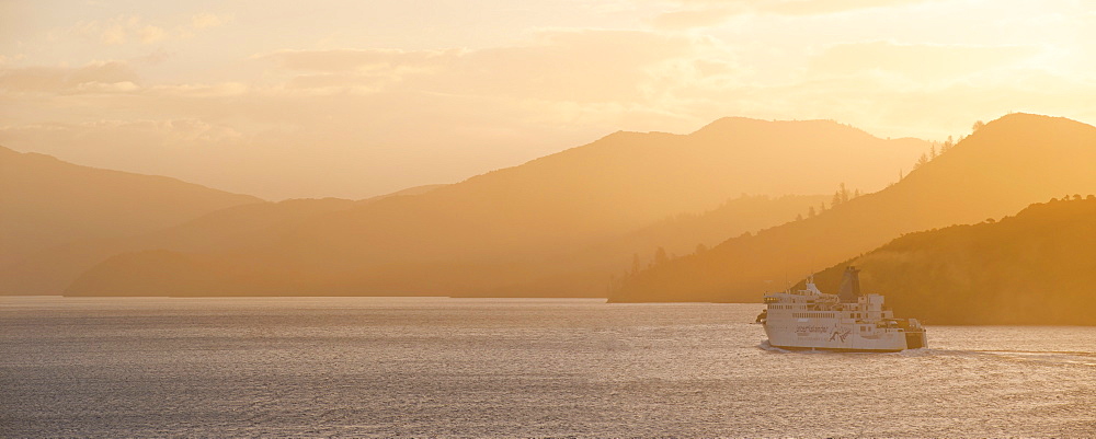 Queen Charlotte Sound at sunset, the Interislander ferry between Picton, South Island and Wellington, North Island, New Zealand, Pacific 