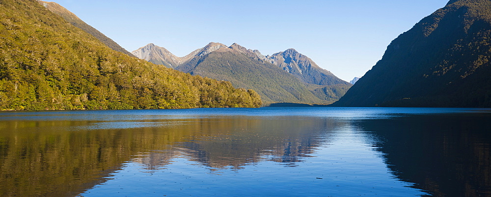 Reflection of mountains in Lake Gunn, Fiordland National Park, UNESCO World Heritage Site, South Island, New Zealand, Pacific 