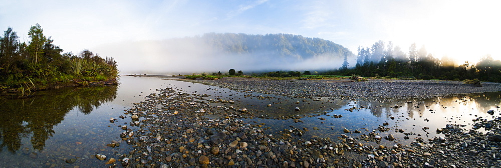 Mist on the Waitangitanoa River at sunrise, Westland National Park, UNESCO World Heritage Site, on the West Coast of South Island, New Zealand, Pacific 