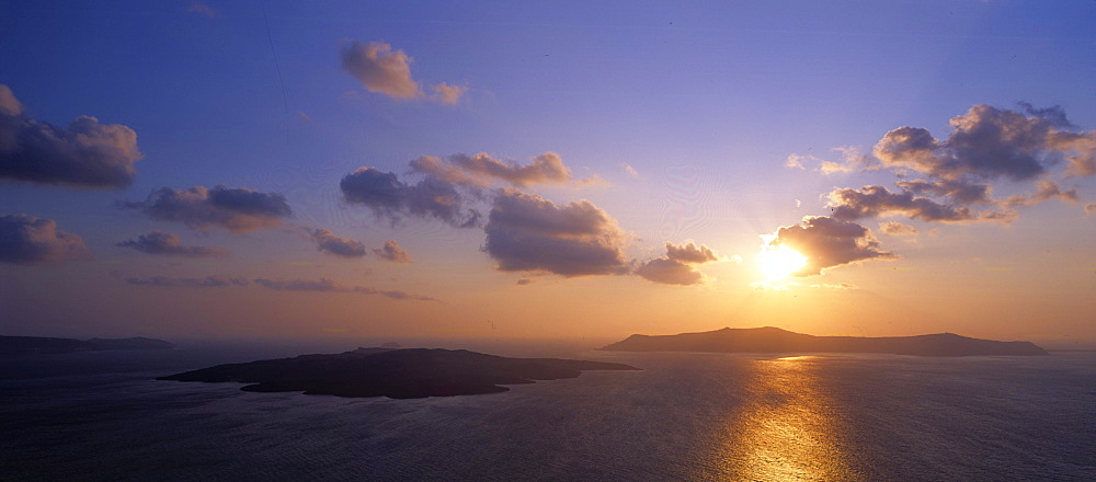 Aerial view of Nea Kameni und Theresia Islands at sunset, Santorin, Greece