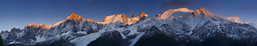 Panorama of Aiguilles du Chamonix, Aiguille du Midi, Mont Blanc du Tacul, Mont Maudit, Mont Blanc and Aiguille du Gouter, Mont Blanc range, Chamonix, Savoy, France